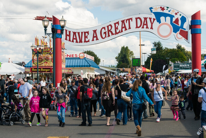 Puyallup, USA - September 26, 2015: People at the Washington state fair late in the day.